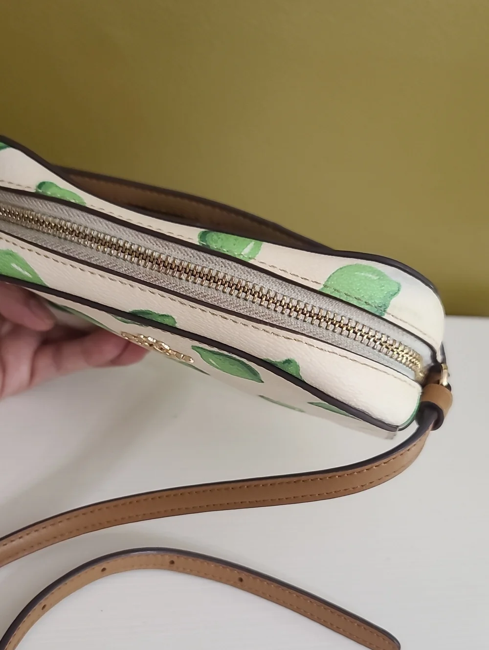 Coach White Crossbody with Green Lemon Motif and Tan Strap
